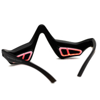 The Unic Skin UNICLED Eye Mask features sharp black frames with pink accents, designed for microstimulation therapy to soothe tired eyes and reduce puffiness, shown from the back against a white background.