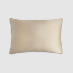 The Sagrada Mulberry Silk Pillowcase by Sagrada BioSkincare, shown in beige with a smooth 22-momme silk cover for thermoregulation, pampers your skin and hair while you rest, displayed against a light gray background.