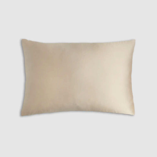 The Sagrada Mulberry Silk Pillowcase by Sagrada BioSkincare, shown in beige with a smooth 22-momme silk cover for thermoregulation, pampers your skin and hair while you rest, displayed against a light gray background.
