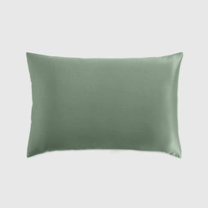 The Sagrada Mulberry Silk Pillowcase by Sagrada BioSkincare, crafted from luxurious 22-momme silk in sage green, pampers your skin and hair while you rest. Displayed against a plain light gray background.